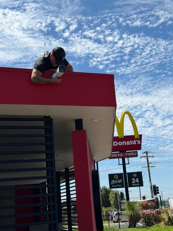 Installing CCTV camera on McDonald's rooftop Dubbo